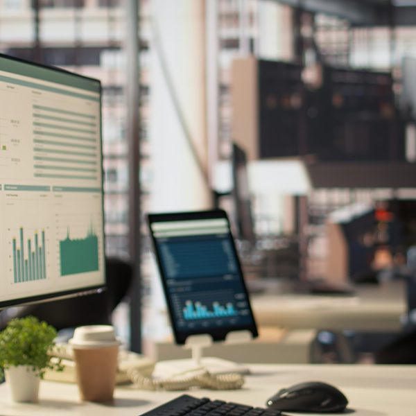 Empty high end office workspace with advanced technology to enhance efficiency Empty high end office workspace with advanced technology to enhance efficiency, helping business professionals focus on financial strategies. Global enterprise success objectives.